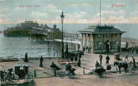 Coloured postcard of the West Pier and kiosk