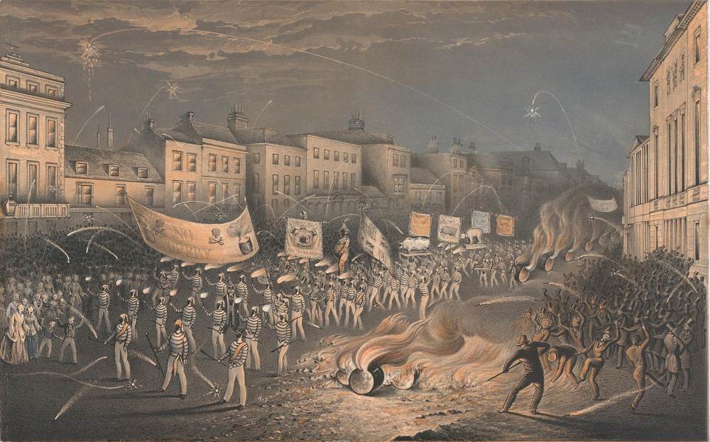 A lithograph of the Lewes Bonfire Boys procession on 5 November 1853, with men in striped jerseys carrying torches and banners past burning barrels and crowds in a Lewes street
