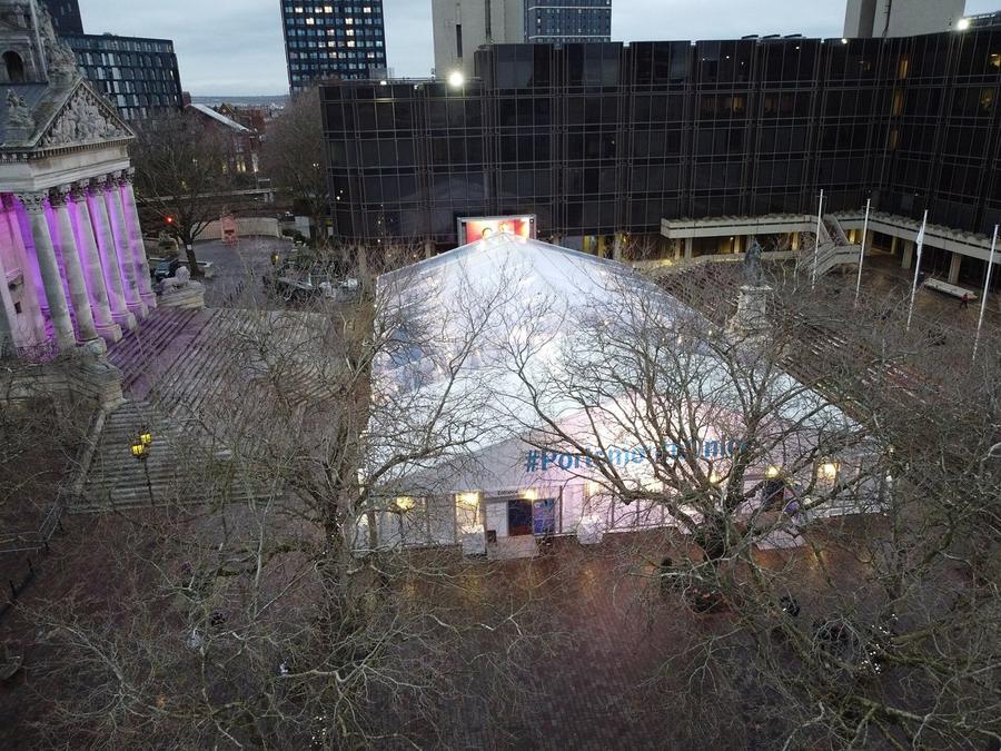 The covered Portsmouth On Ice rink in Guildhall Square seen from above at dusk