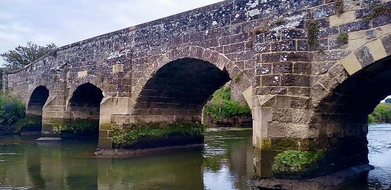 Pulborough Bridge, an old stone bridge with several arches crossing the River Arun