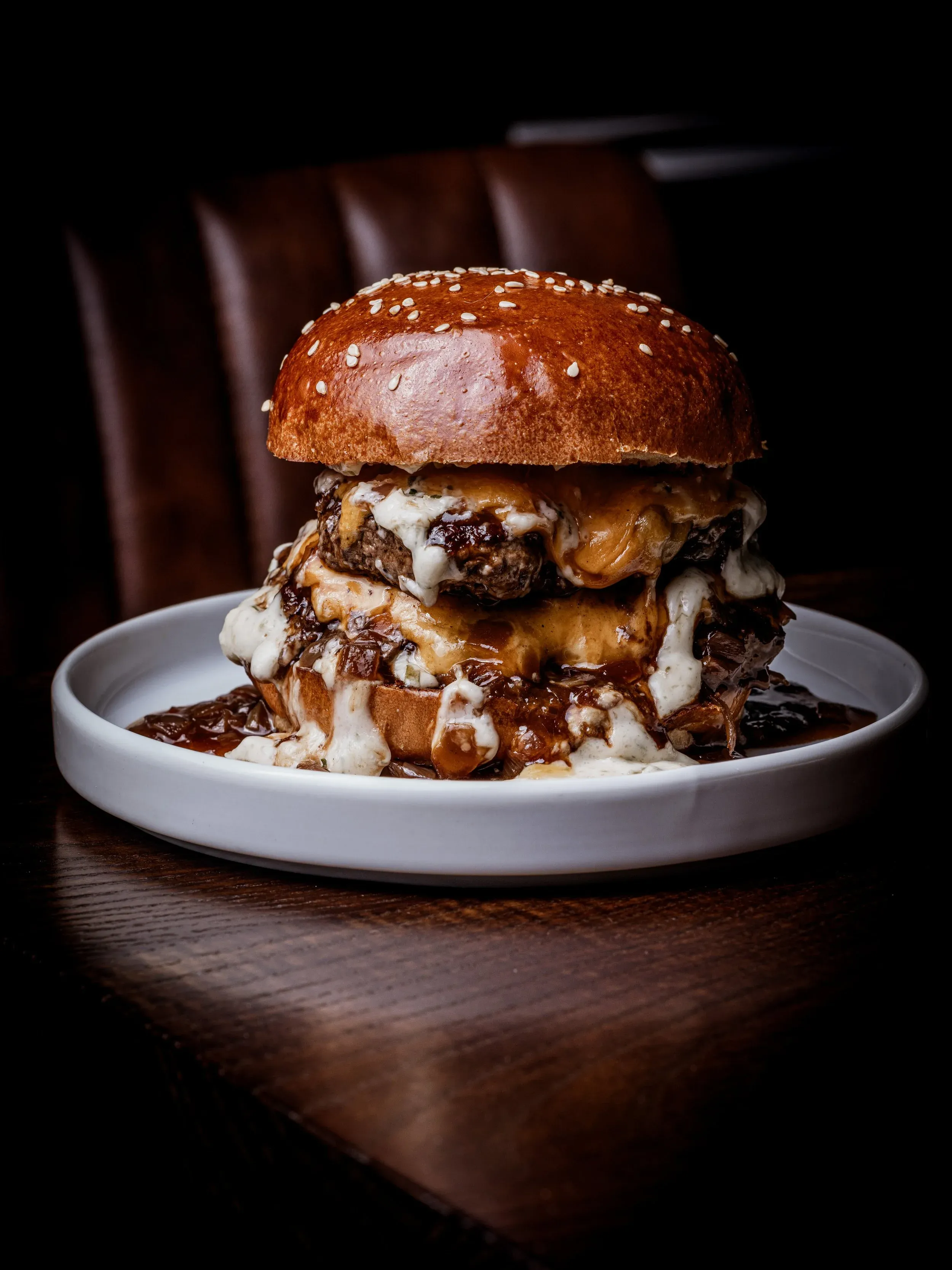 Burger & Beyond's signature double cheeseburger made with dry-aged beef, melted cheese and house sauce. Photo: Burger & Beyond